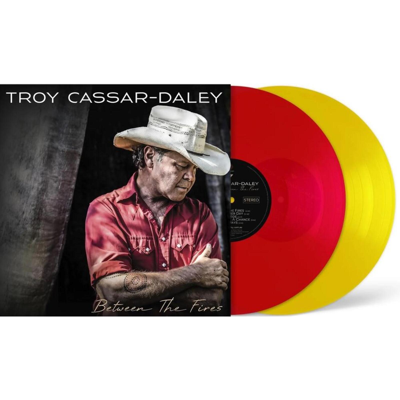 Picture of Troy Cassar-Daley - Between The Fires (Transparent Red / Yellow Vinyl)